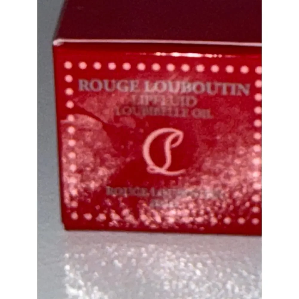NIB Christian Louboutin Loubibelle Lip Oil Rouge Louboutin 001O Plumping Gloss